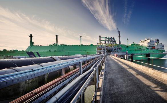 Ship docked at the end of the jetty at the Grain LNG terminal in Kent
