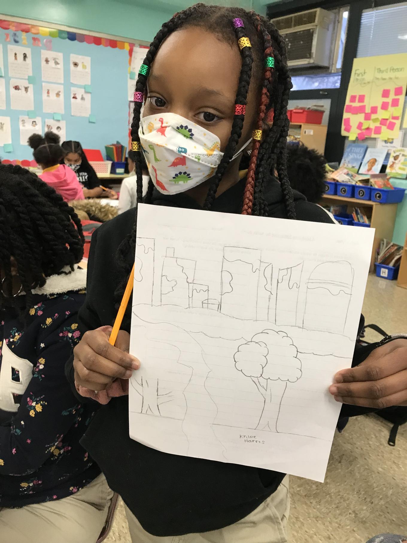 Kid showing his Drawing 