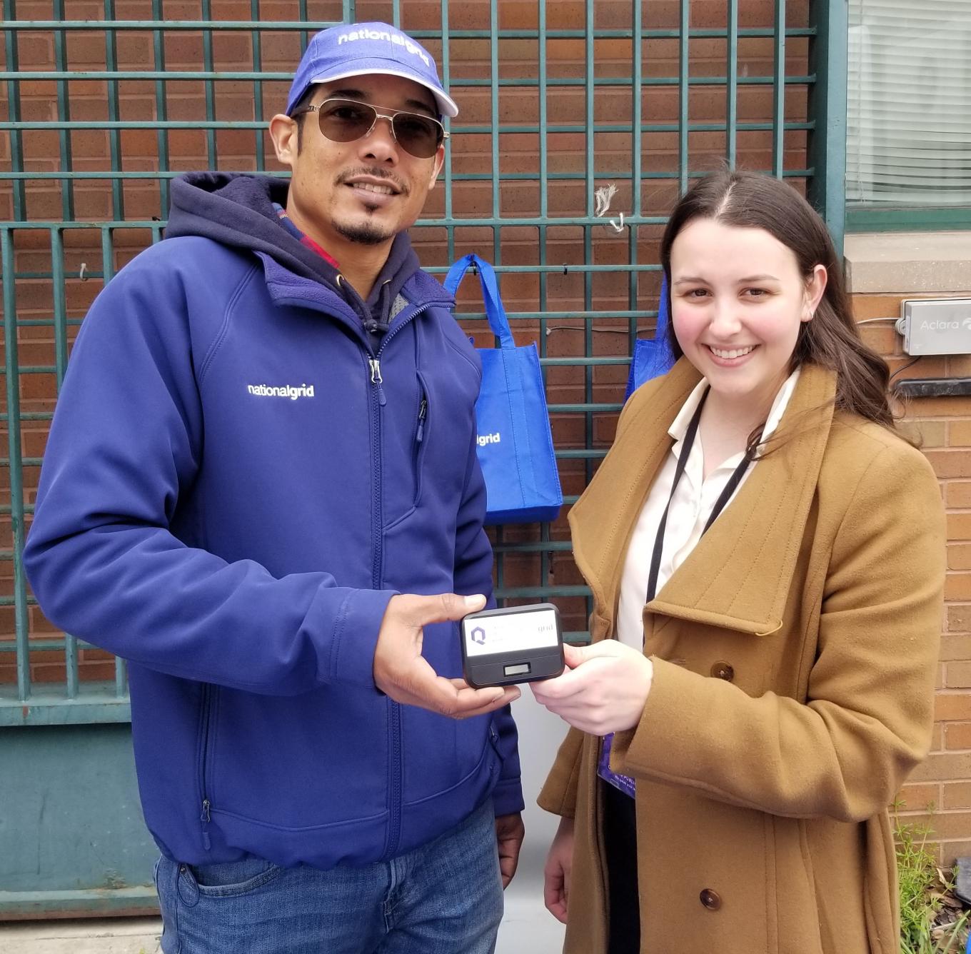 Public Library Foundation holding mobile hotspot device