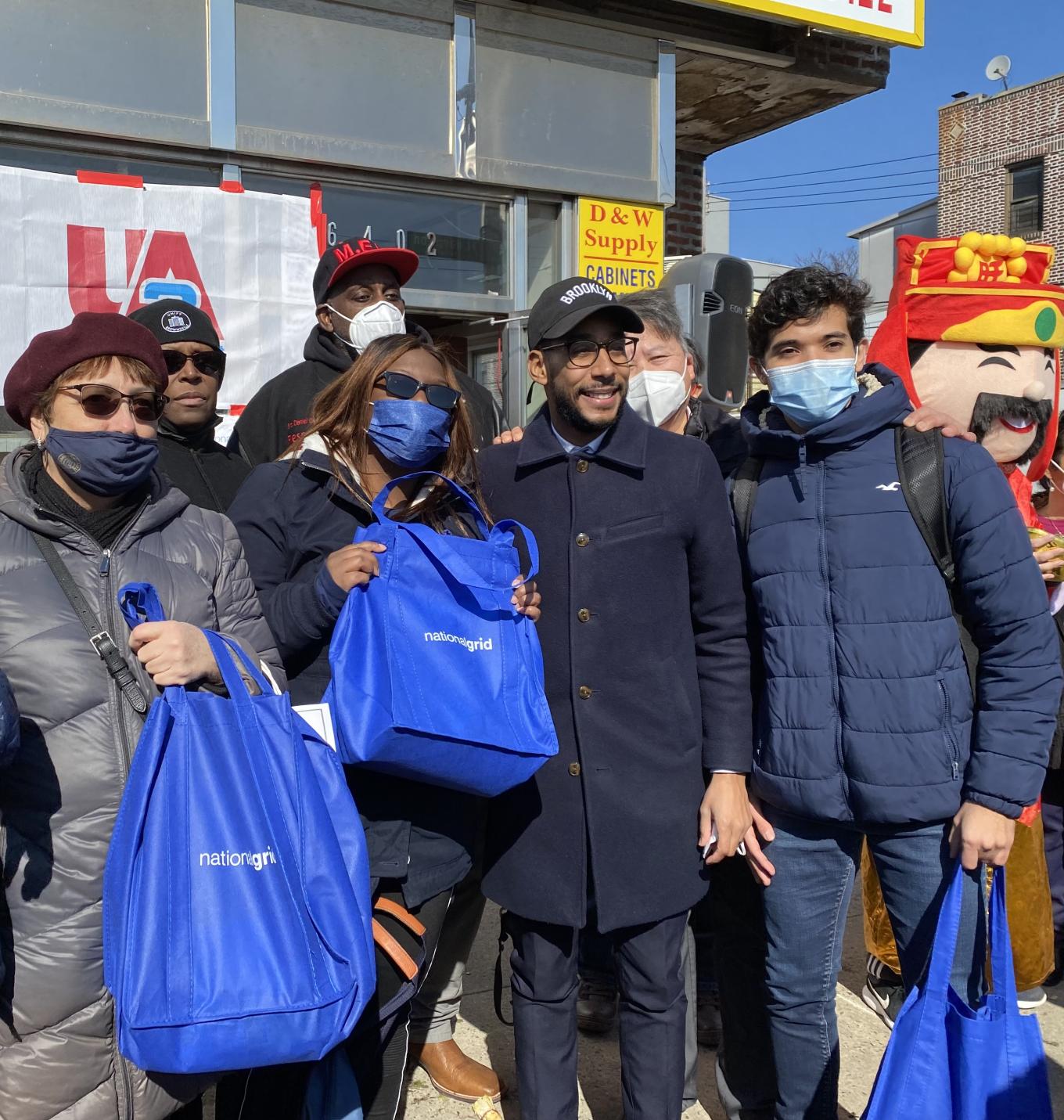 National Grid volunteers holding bags