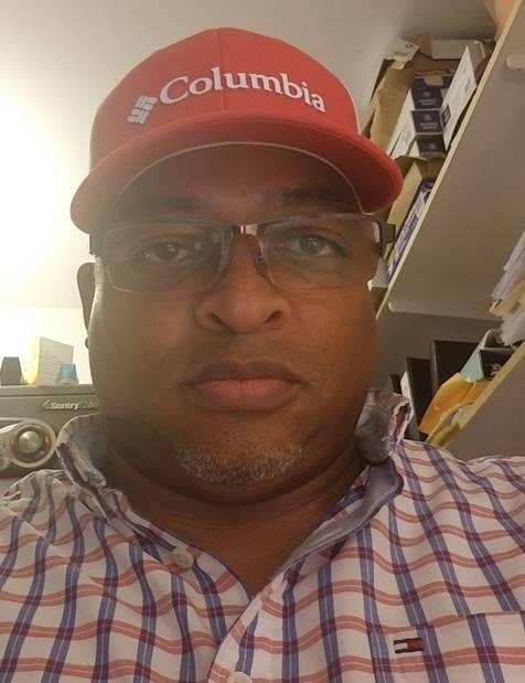 Persons wearing red hat taking selfie 