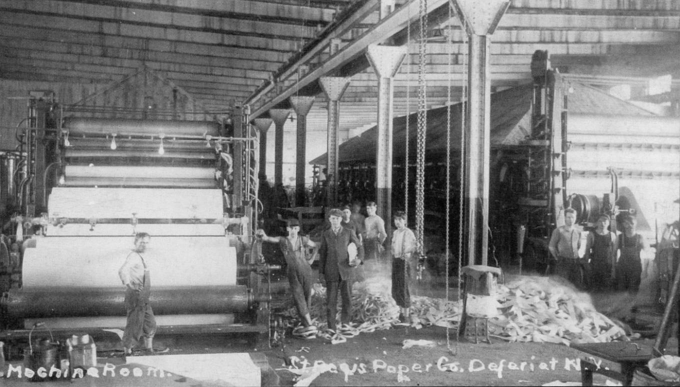 Workers on the factory floor at the St. Regis Paper mill in Deferiet