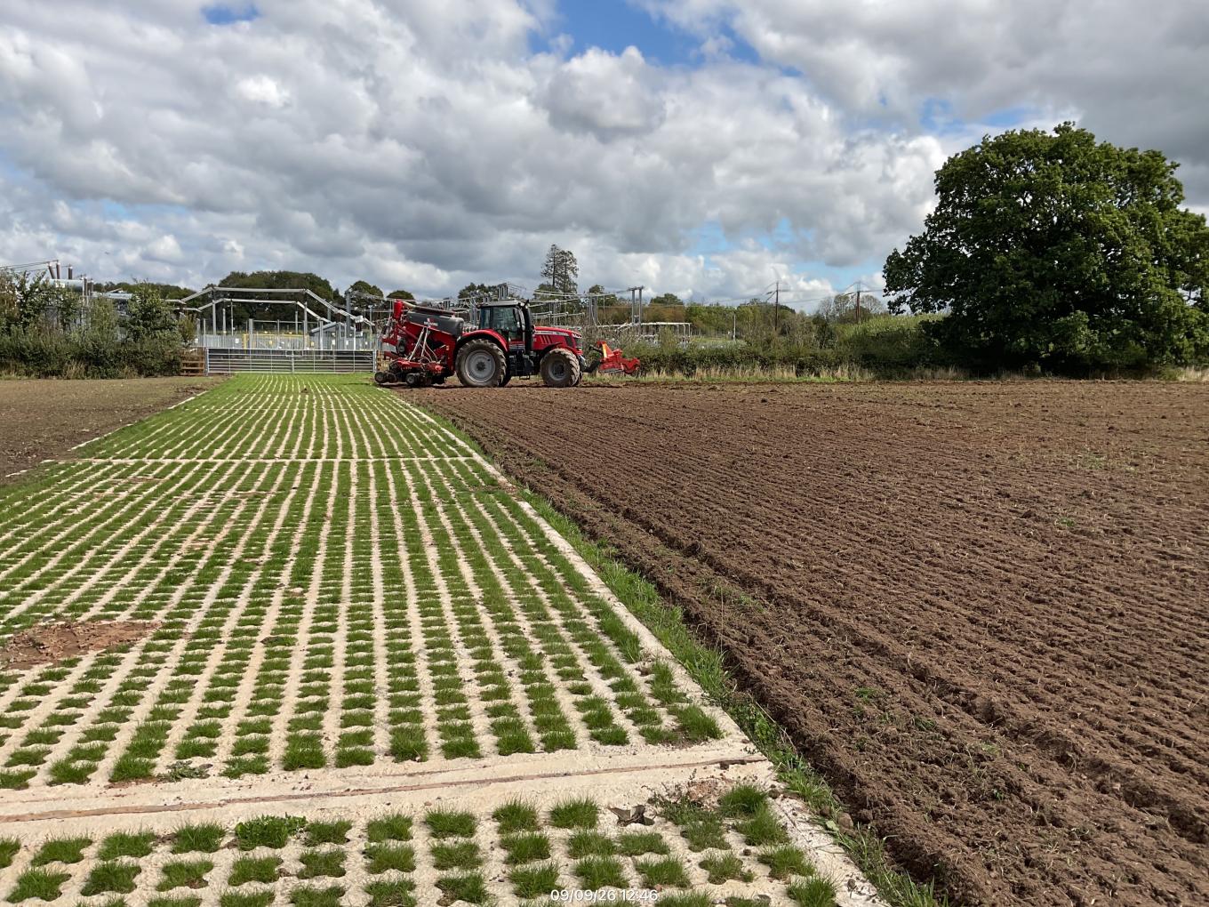 Image of the new Grasscrete road with a tractor in the background