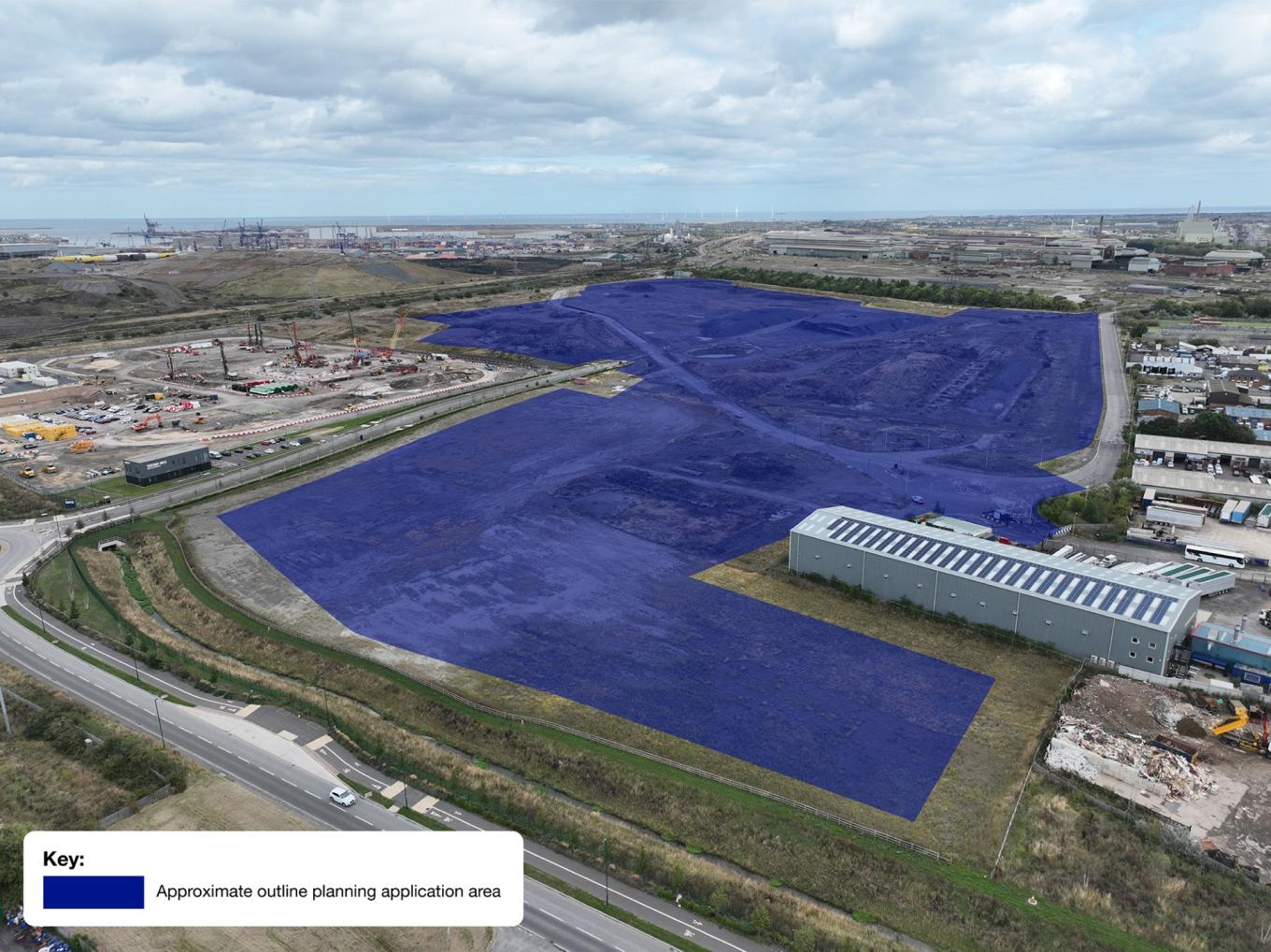 An aerial image of the proposed site with a blue overlay outlining the approximate outline planning application area.