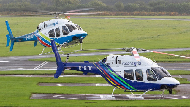 Two National Grid branded helicopters