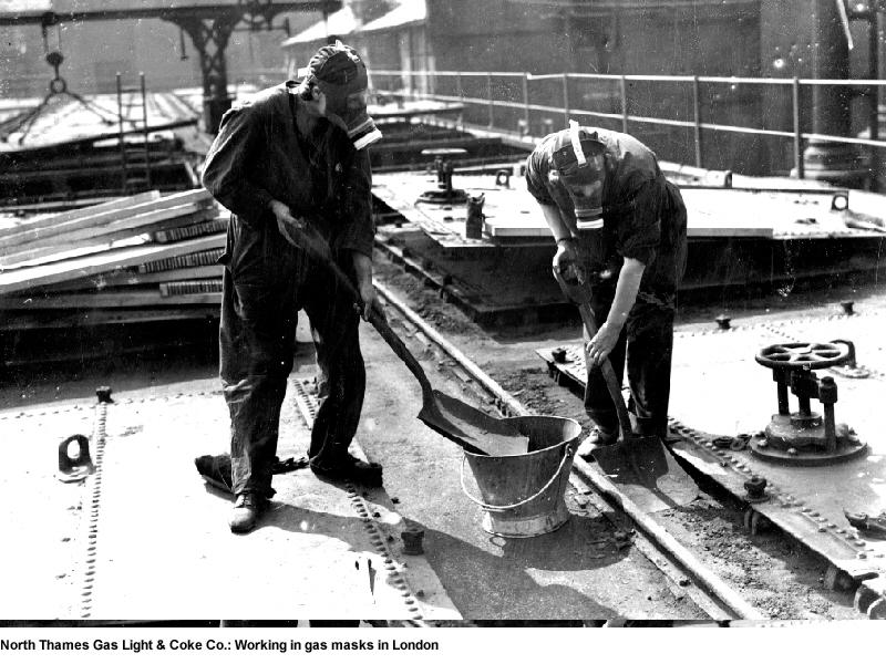 Workers wearing gas masks during WW2 in London - used for the National Grid story 'VE Day 2020: The people powering the nation during WW2'