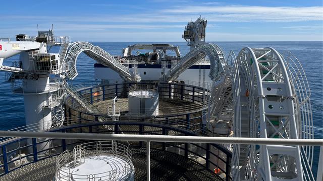 Electricity interconnector cable carousels on cable laying ship