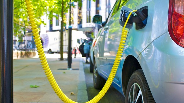 Electric car charging in street for National Grid article