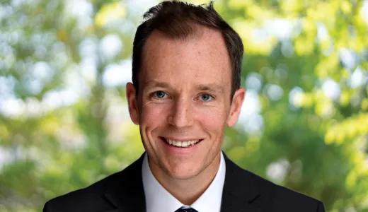 A photo of Andrew Downey who is the interim director of investor relations