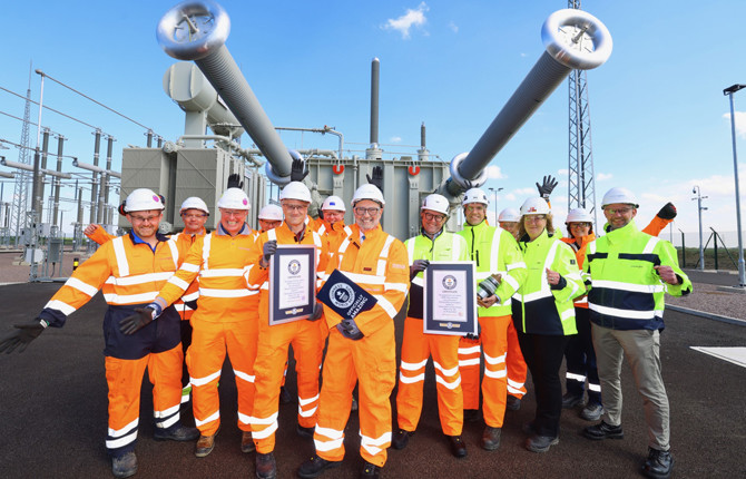 Viking Link team members holding the Guinness World Record certificates and plaque