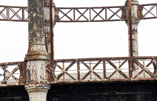 Close up of a section of the Great Yarmouth Gas Holder showing the crumbling paintwork