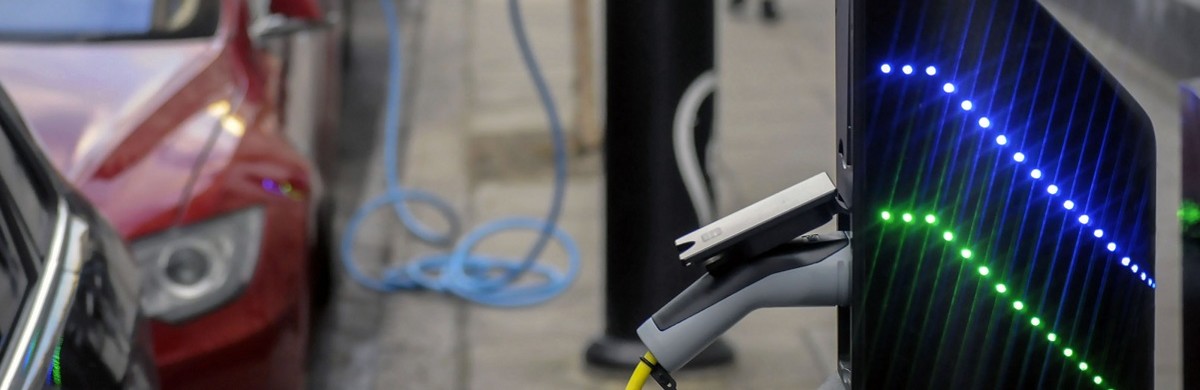 Electric car charging in street for National Grid article
