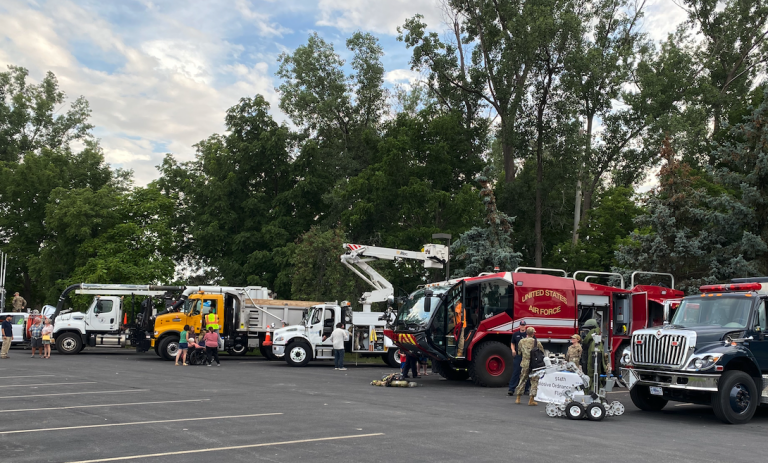 bucket truck was displayed among other vehicles at  Honk for Heroes event