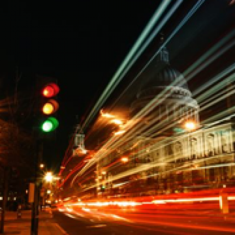 Night-time image of a busy road and traffic lights in a city - Corporate Governance