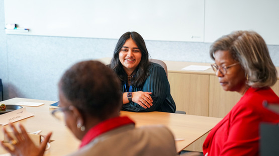 Leela chairing meeting with women leaders for Girls Takeover