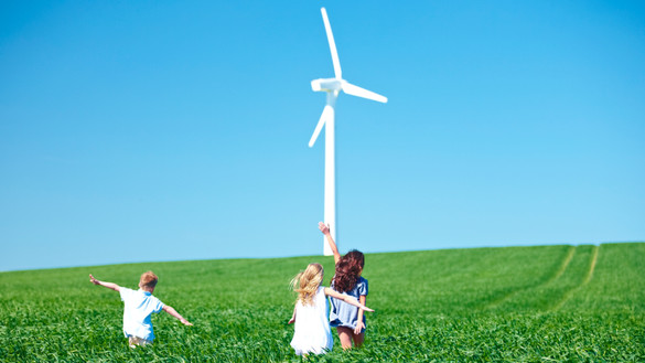children-in-field-wind turbine-banner