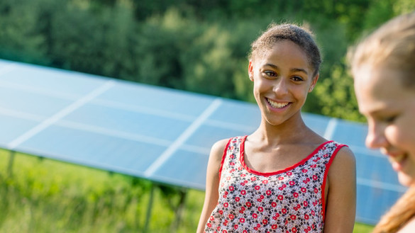 young-women-solar-panel