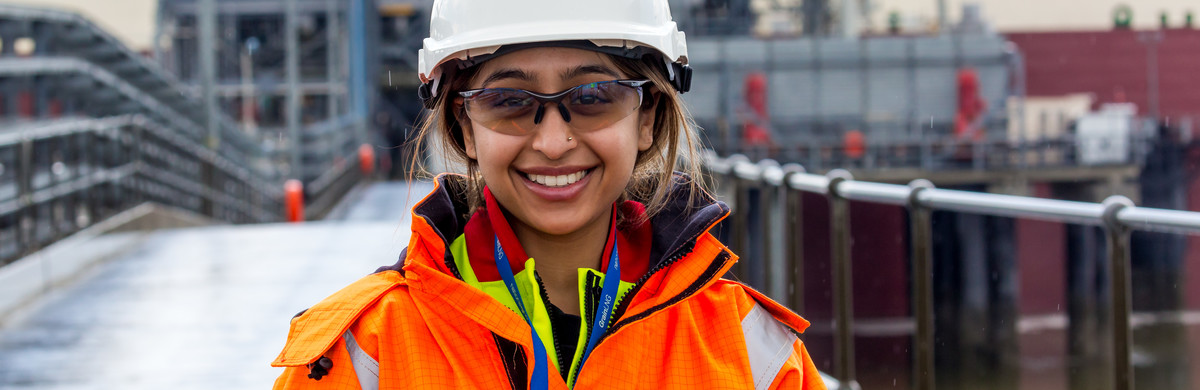 Female engineer wearing PPE on the jetty at Grain LNG terminal